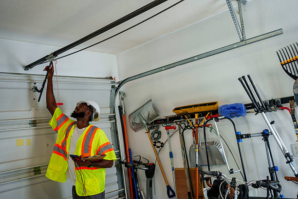 Professional Garage Door Panel Replacement technician working in Elmira, NY